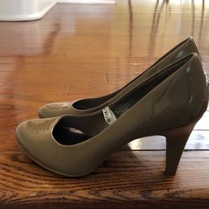 Nude round toe pumps never warn